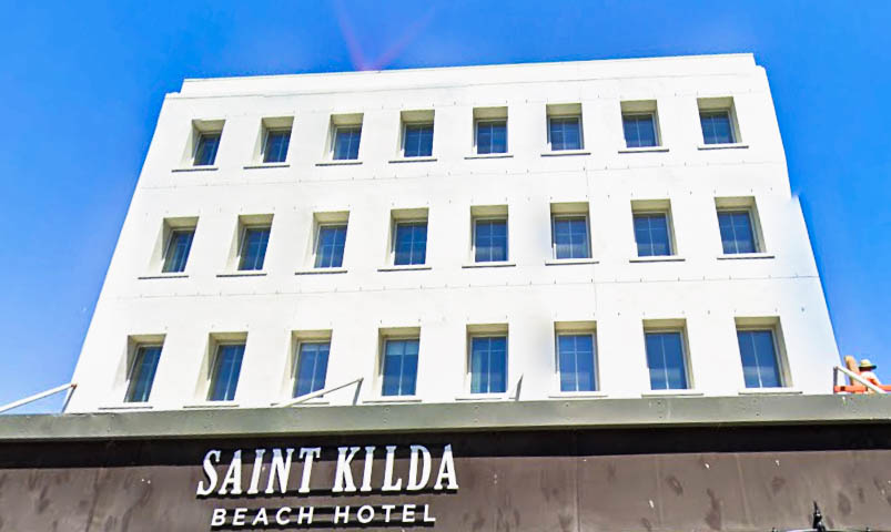 Exterior view of St Kilda Beach Hotel with modern facade, located just steps from the beach and the vibrant Esplanade.