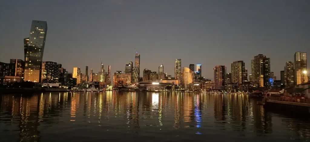 Melbourne CBD skyline at night with city lights reflecting on the Yarra River